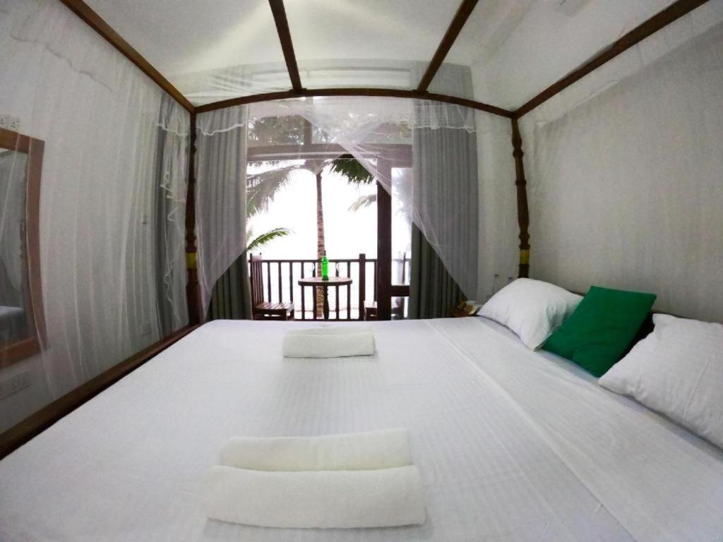 Asa Bay Beach Resort Talpe Eksteriør bilde